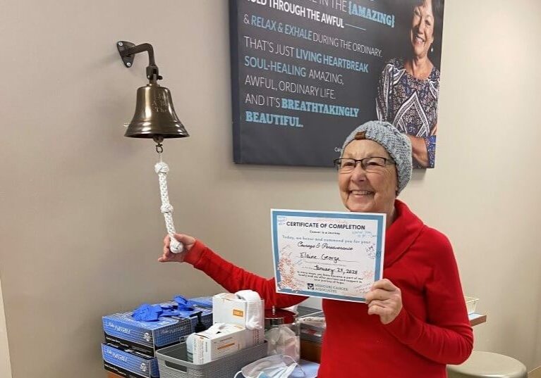 My mom ringing the bell to celebrate as she finishes her treatment for breast cancer!