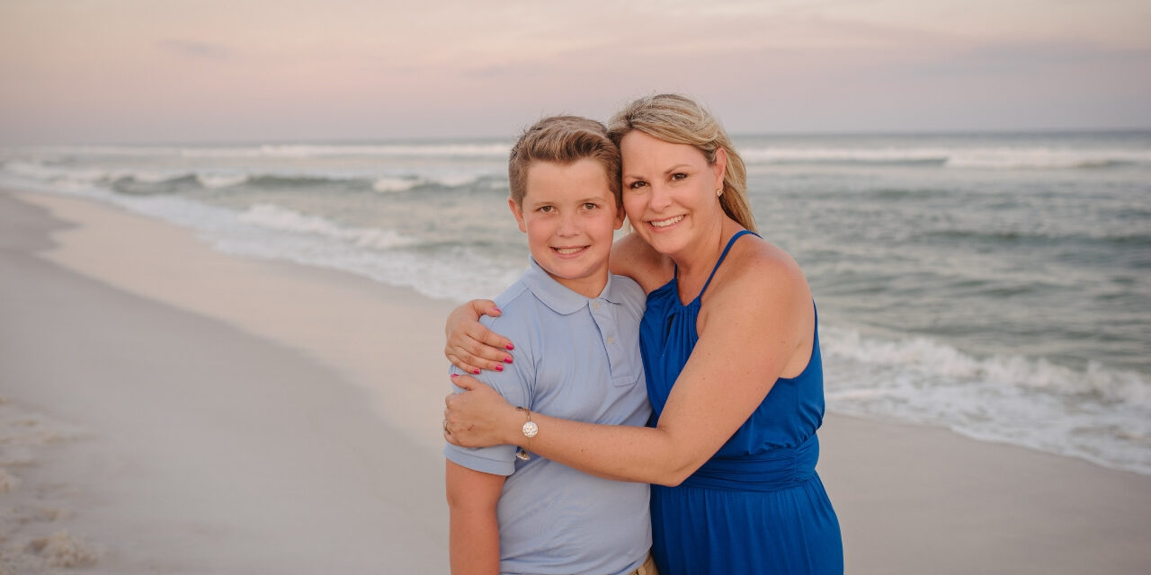 Kim Becking with son at the beach